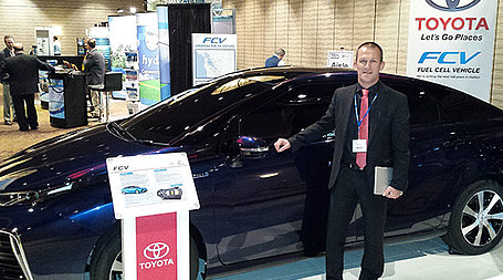 SEO Mathias Bode in front of a Toyota Fuel Cell Vehicle 